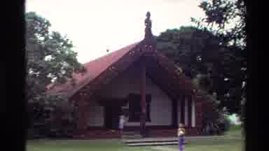 New Zealand (1981): Statute Standing On Red Rooftop Of White Building On A Clear