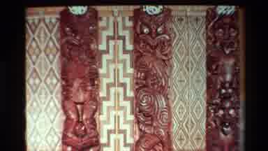 New Zealand (1981): Tribal Totems On Wall With Flash Of A Tattooed Tribe Member