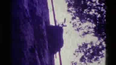 New Zealand (1981): Zoom Ins Into What Appears To Be A Rock Then Switches To A Map