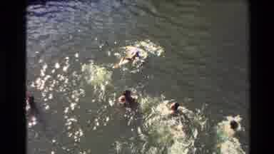 New Zealand (1981): People Swimming In The River And People Entering The Church