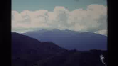 New Zealand (1981): Lush Mountains And Statue Or Art Of Indigenous Men