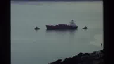 New Zealand (1981): Boat Sitting In Bay By Coastal City