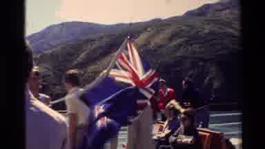 New Zealand (1982): Flag Of New Zealand Is Raised Aboard A Ship Sailing Among