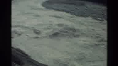 New Zealand (1982): Two Flowing Rivers Going Downstream In Nature On A Clear Day