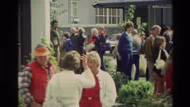 New Zealand (1982): People Gathering To Watch Bagpipe Players March In Formation