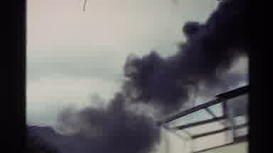 New Zealand (1982): Smoke Coming Out Of Boat While It Drives Through The Mountains