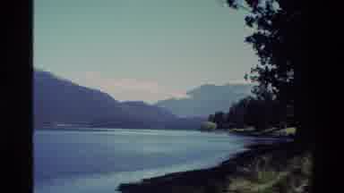 New Zealand (1982): The Shoreline Of A Beautiful Mountain Lake Surrounded By