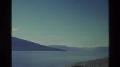 New Zealand (1982): Scenery Of Trees Mountains Sky And Clouds