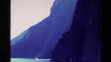 New Zealand (1982): A Boat Is Flowing Through A River Found In A Valley Through