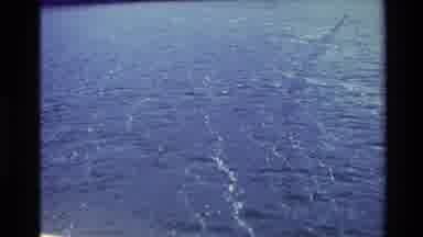 New Zealand (1982): People On Surfboard Trying To Make It Through Tough Water