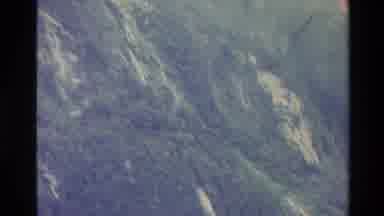 New Zealand (1982): Filming The Side Of A Mountain From A Lake Bed