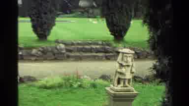 New Zealand (1982): Statue In A Garden In Front Of Stone Steps And A Road With A