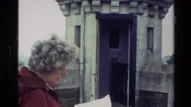 New Zealand (1982): Elderly Woman Reading Off Interesting Historical Facts About