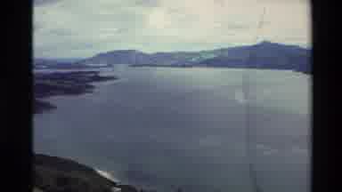 New Zealand (1982): Footage Taken Of A Large Lake With A Picture Of A Church At
