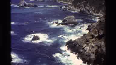 Big Sur California USA (1980): Ocean Water Colliding With Rocks And A Man