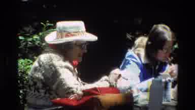 Big Sur California USA (1980): Women Wearing Hats And Coats At An Outdoor Craft