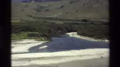 Big Sur California USA (1980): Aerial Waves Coming Into A Beach With Mountains In