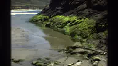 Big Sur California USA (1980): Wave Breaks Outside A Quiet Inlet With Sand An