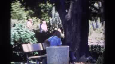 Big Sur California USA (1980): Person Sitting On Bench And Pan To Shot Of Sign On
