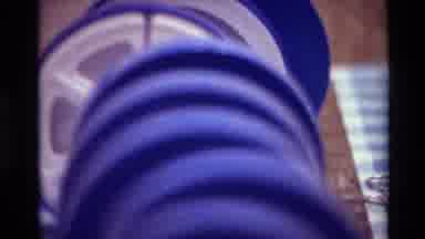 Big Sur California USA (1980): Blue Materials On Wooden Spindles On Display On
