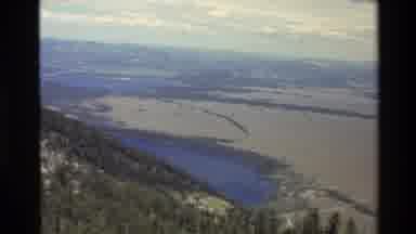 Grand Teton Wyoming USA (1980): Looking Down Over Some Mountains Grass And Lakes
