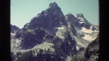 Grand Teton Wyoming USA (1980): Panning A Lightly Snow Covered Rocky Mountain