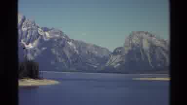 Grand Teton Wyoming USA (1980): Resuming Footage Of Mountains In Front Of Lake