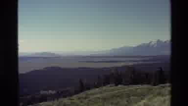Grand Teton Wyoming USA (1980): Scene With Rolling Forests A Large Lake And A
