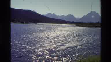 Grand Teton Wyoming USA (1980): Sparkling Active Water Surrounded By Green Trees