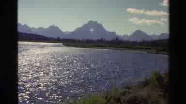 Grand Teton Wyoming USA (1980): Boat Sailing On Calm Water On A Bright Sunny Day