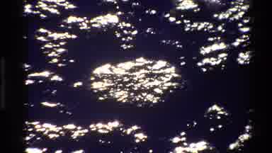 Grand Teton Wyoming USA (1980): Boats On The Water In A Lake Clouds Fill The Air