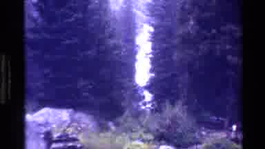Grand Teton Wyoming USA (1980): Man Walking Distance Pine Trees Rocks Bushes