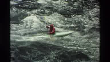 Grand Teton Wyoming USA (1980): Person Wearing Red Shirt Kayaking Through Rough