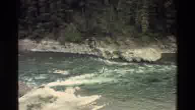 Grand Teton Wyoming USA (1980): People Kayaking And Rafting Down White Water