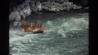 Grand Teton Wyoming USA (1980): Zooming Out Footage Of People White Water Rafting