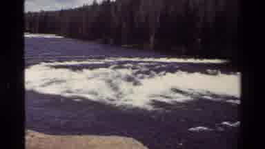Grand Teton Wyoming USA (1980): Panning Footage Of Wake Created By Small Waterfall