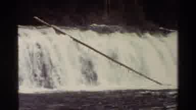 Grand Teton Wyoming USA (1980): Water Roaring Over The Edge Under A Cloudy Blue