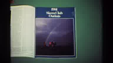 British Columbia USA (1981): Hand Flipping Pages Of What Appears To Be A Magazine