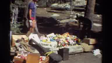 British Columbia USA (1981): Man Is Throwing Something To A Boy And Two People Are