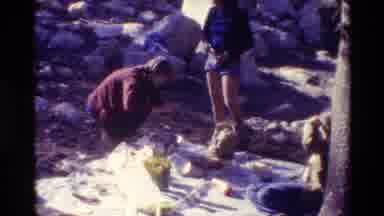 British Columbia USA (1981): A Group Of People Picnicking In The Woods With Rocks