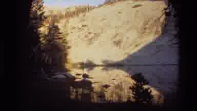 British Columbia USA (1981): Mountains Rocks River Water Forest Grass Ground Sun
