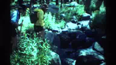 British Columbia USA (1981): People Hiking On Rocks Near A Stream And Standing In