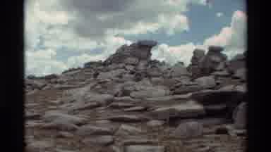 British Columbia USA (1981): People Walking Down From Steep Rock Formation On A