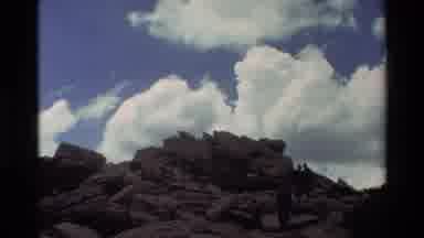 British Columbia USA (1981): Men Walking Down A Hill