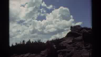 British Columbia USA (1981): Two People Hiking In A Trailwalk Through The Rocky