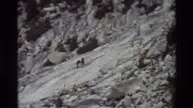 British Columbia USA (1981): Steep Rocky Mountain With Low Bushes And A Few