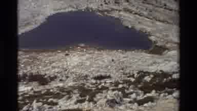 British Columbia USA (1981): Two People Reach A Summit And Take A Look Back Below
