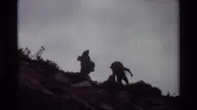 British Columbia USA (1981): Two Campers Climbing Rocky Terrain