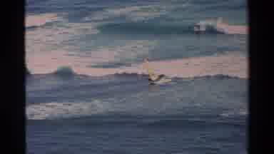 Hawaii USA (1981): Sailing Boat And Surfing At The Beach On A Sunny Day