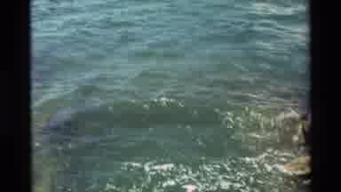 Hawaii USA (1981): Calming Waves Crashing Against Rocks On A Clear Blue Day